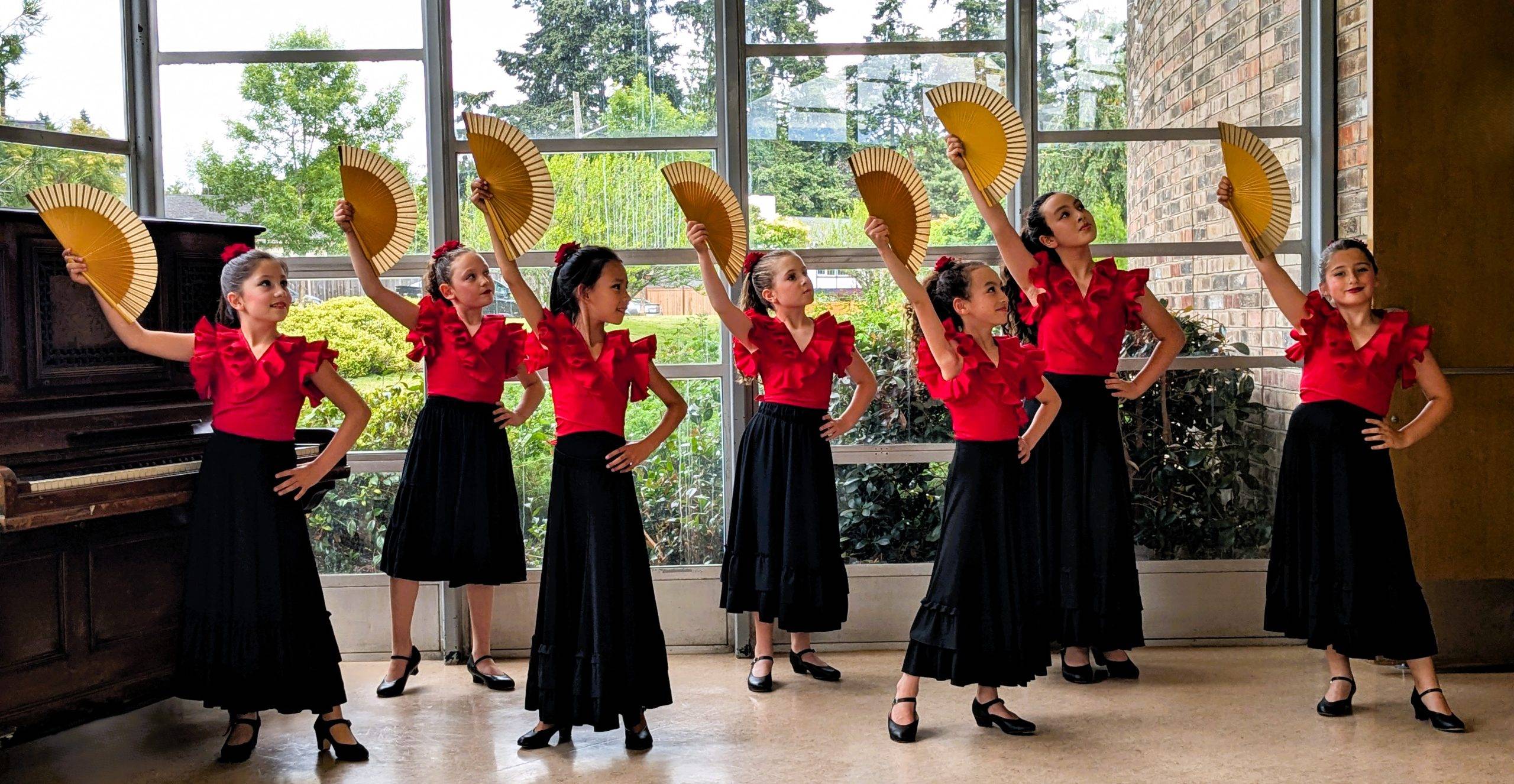 ADI RECITAL 2024: From left to right, front row: Maya, Zinnia, Sophia, Nila, 2nd row: Summer, Maple and Evelyn